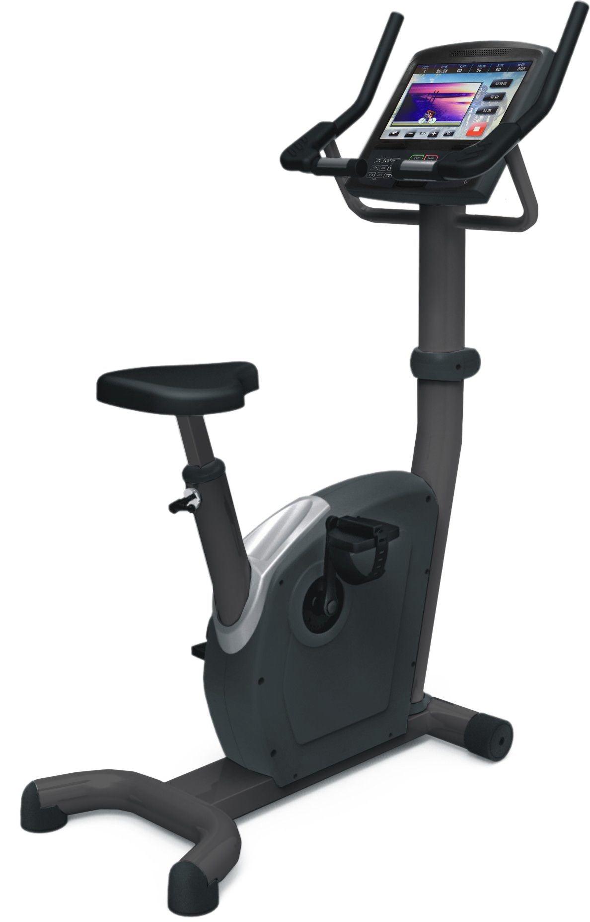 Stationary exercise bike with a large screen console and upright handlebars.