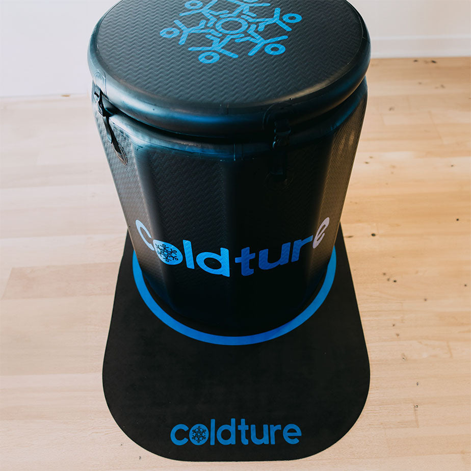 Coldture Barrel + Chiller Pro, a sleek black barrel with a blue logo, placed on a matching black mat.
