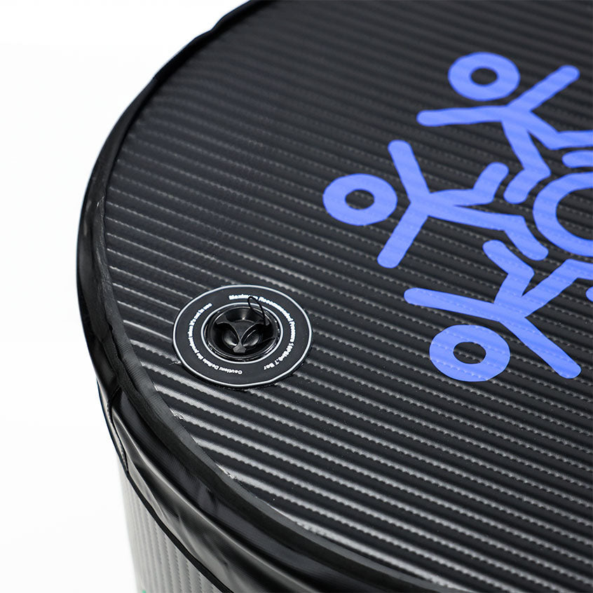 Top view of the Coldture Ultra Barrel Light showcasing its black textured surface and blue logo design.