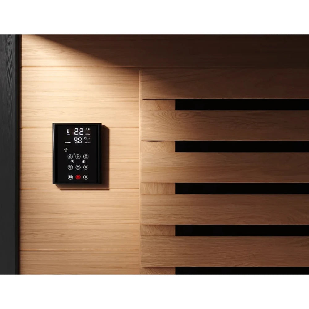Sauna control panel on light wood wall, featuring digital display and sleek black design.