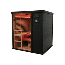 Infrared sauna cabin with black exterior wood paneling, glass front door, and warm red-orange interior lighting. Two-tier wooden benches visible inside with horizontal slat walls and control panel on the exterior.