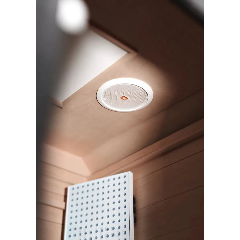 JBL ceiling speaker in a wooden sauna room.