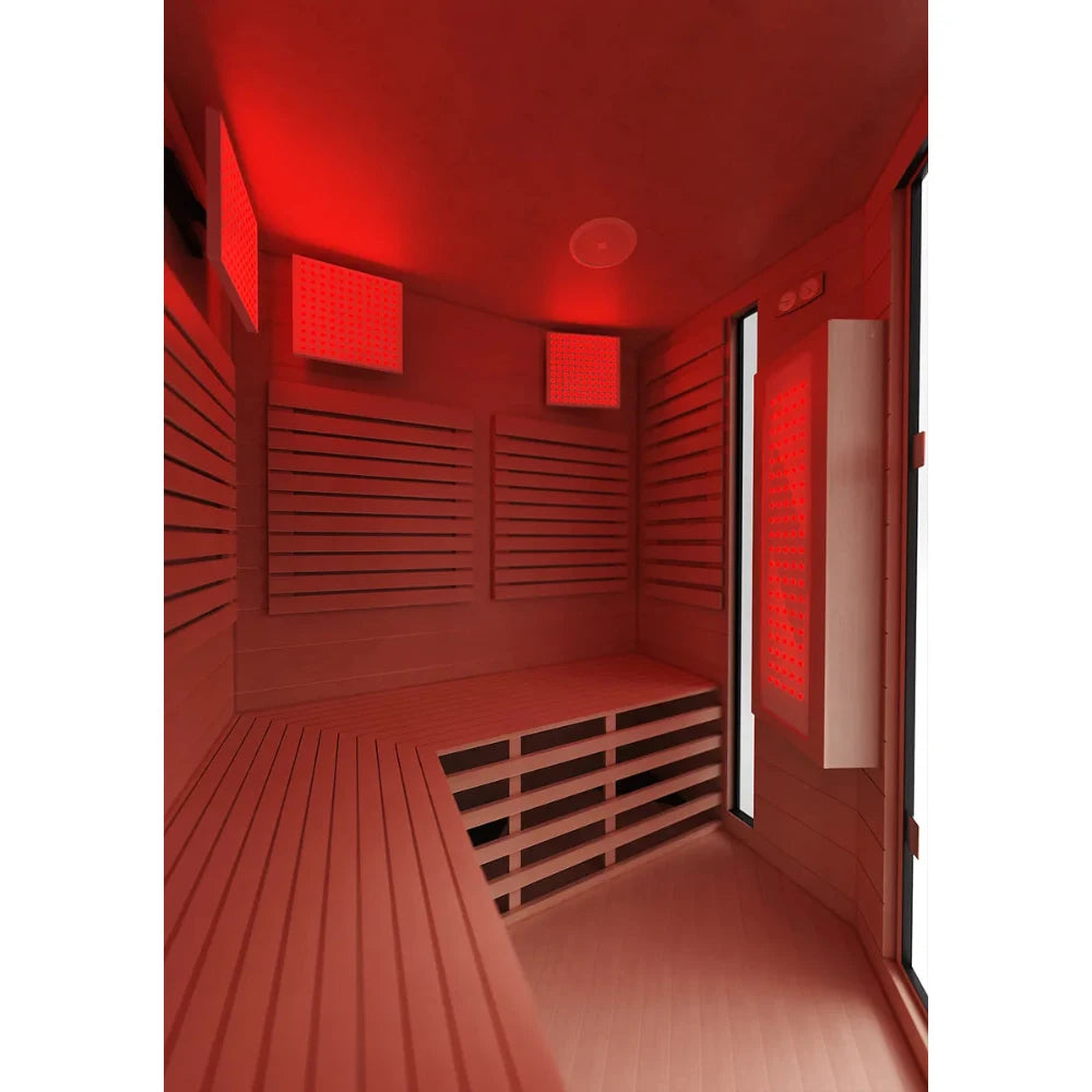 Luxury infrared sauna with red light panels and wooden benches.
