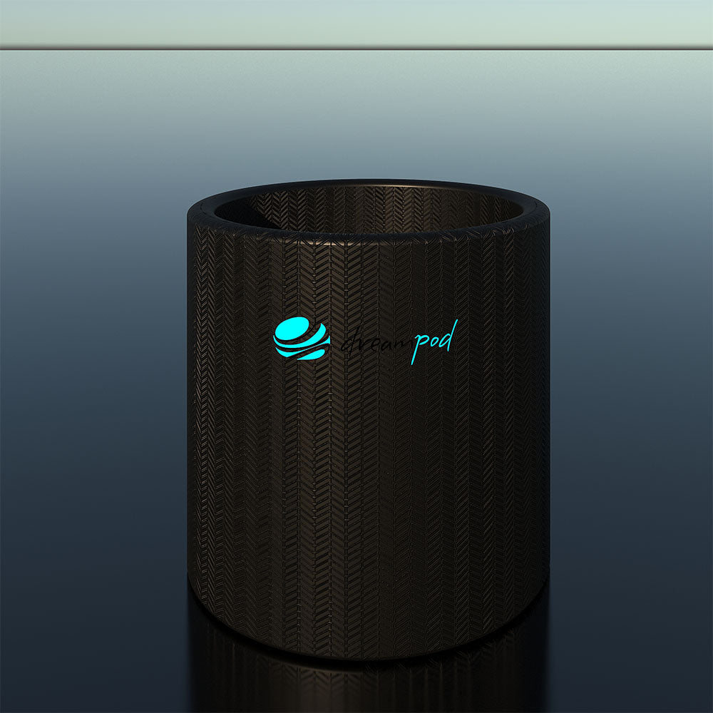 Dreampod Cold Plunge Barrel Flex, a sleek black barrel with a textured surface, positioned against a reflective background.