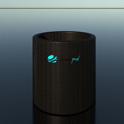 Dreampod Cold Plunge Barrel Flex, a sleek black barrel with a textured surface, positioned against a reflective background.