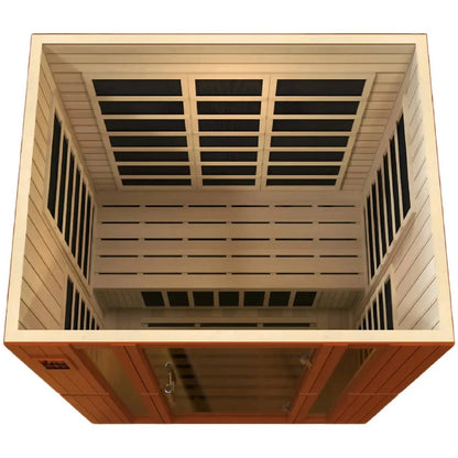 Interior view of the Dynamic Bellagio 3 Person Far Infrared Sauna, showcasing the wooden structure and heating panels.