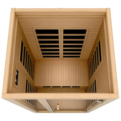 Interior view of the Dynamic Gracia 1-2 Person Far Infrared Sauna, showcasing wooden paneling and heating elements.