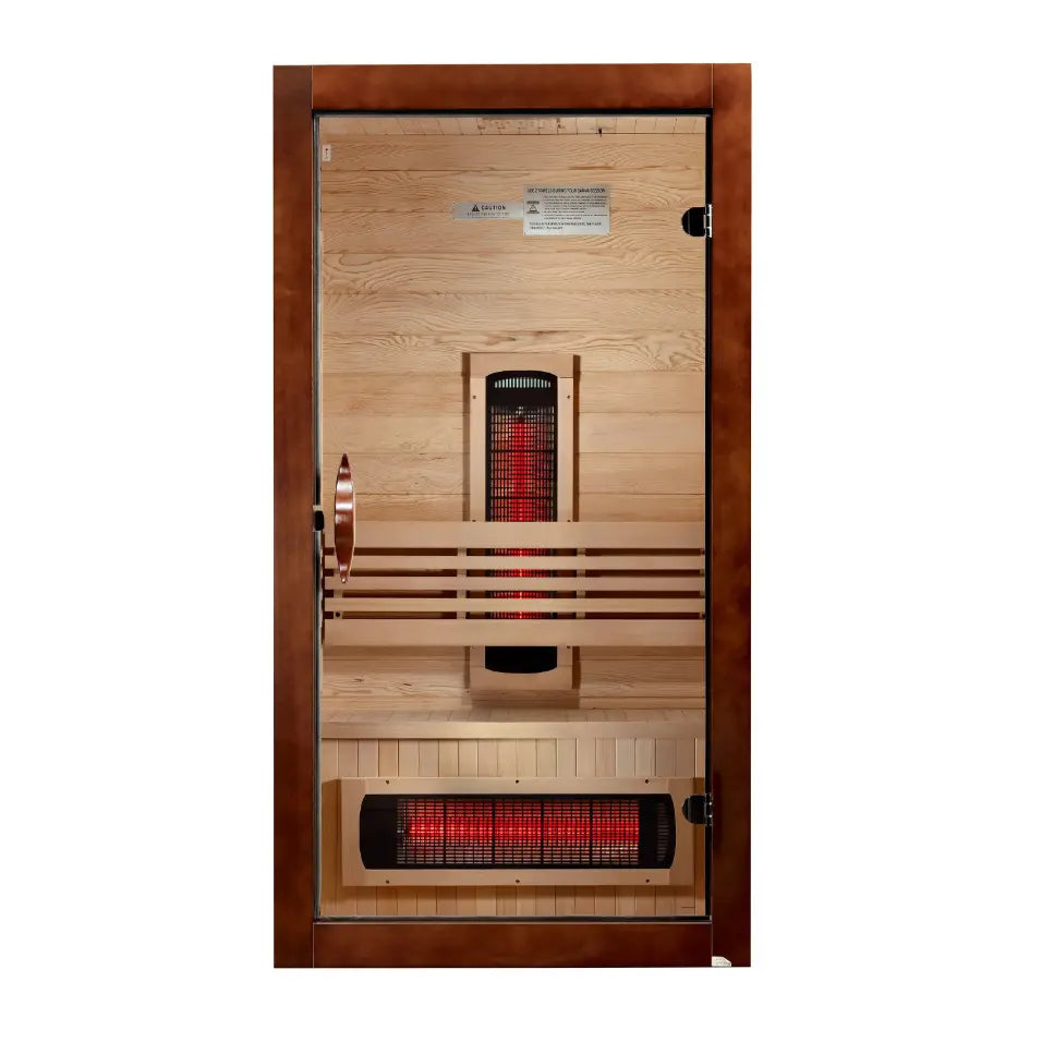 Front view of a wooden infrared sauna with heater and glass door.