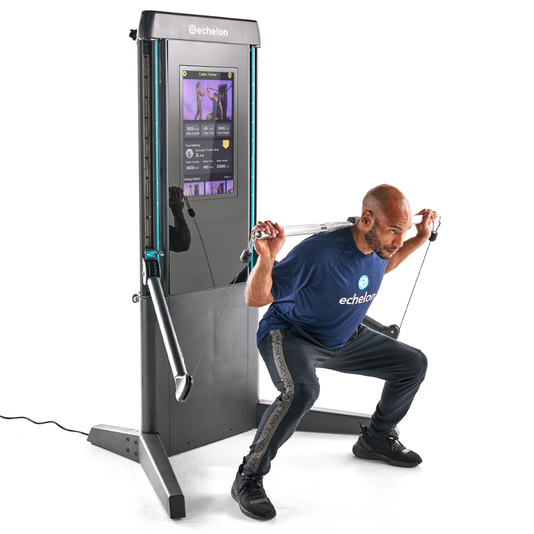 A person performing a squat exercise using the Echelon ES-PRO Commercial Strength Machine, featuring a digital display and adjustable cables.