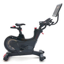 Echelon EX-PRO Smart Connect Bike featuring a sleek design with adjustable seat and handlebars, and a display screen for interactive workouts.