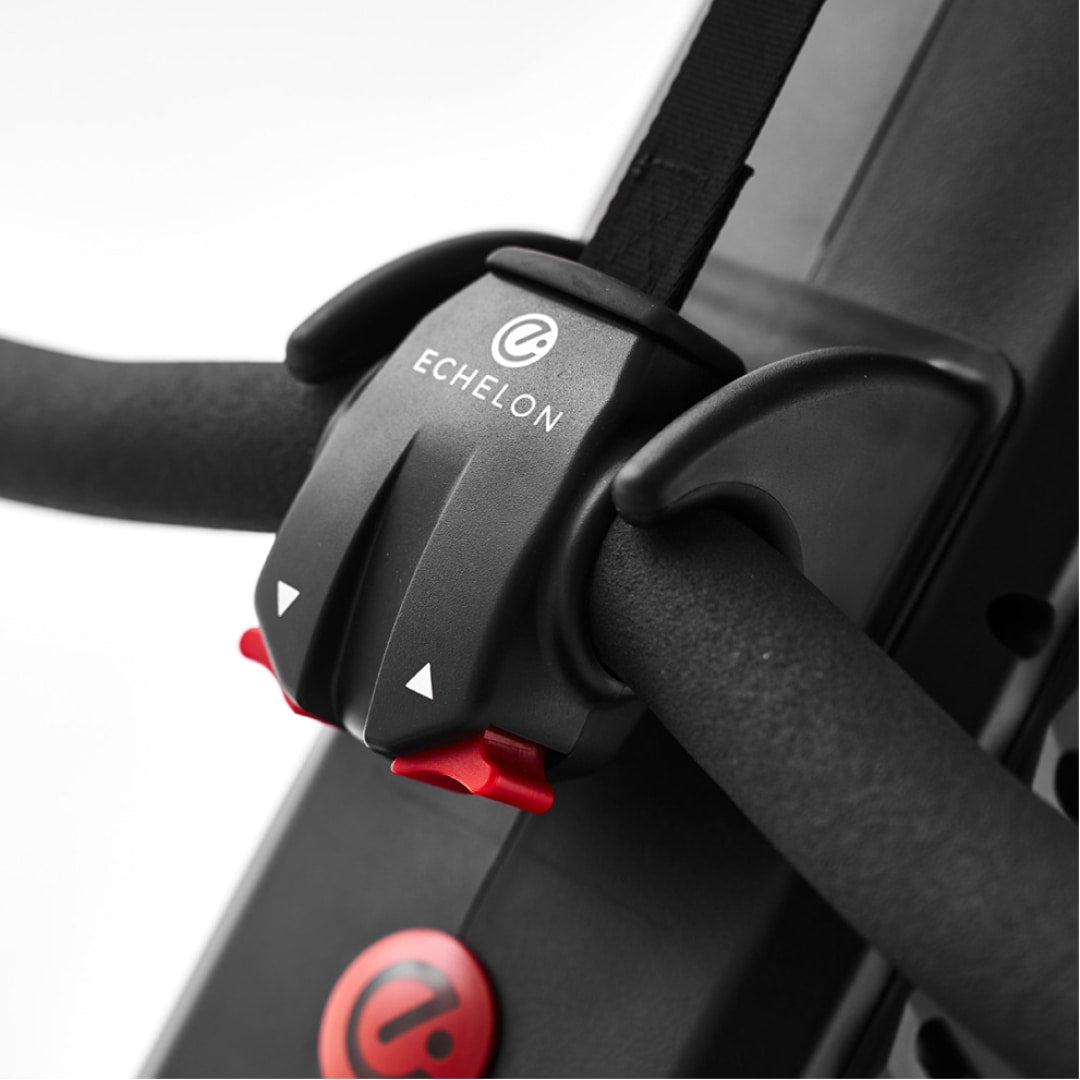 Close-up view of the tension adjustment mechanism on the Echelon Row-7S Rowing Machine, featuring the Echelon logo and red adjustment buttons.