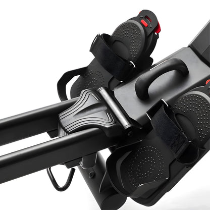 Close-up view of the footrests and handles of the Echelon Row-7S Rowing Machine, highlighting the adjustable straps and ergonomic design.