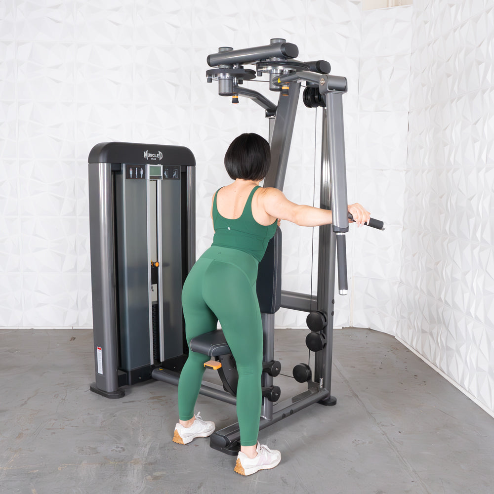 Person using Elite-Plus Pec-Rear Delt machine in gym.