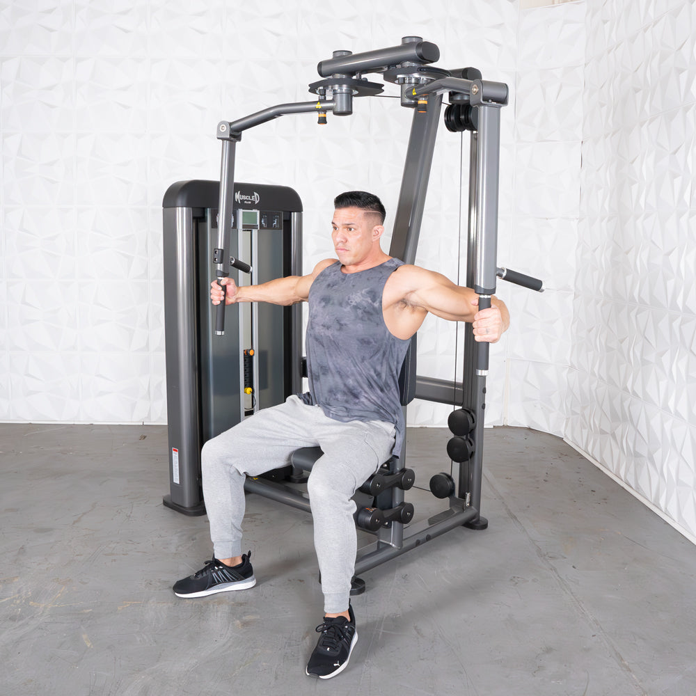 Man on Elite-Plus Pec Rear Delt machine performing chest/shoulder workout.