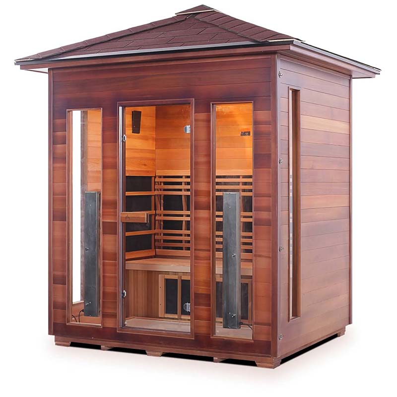 Outdoor sauna with cedar wood exterior and glass doors for a luxurious spa experience.