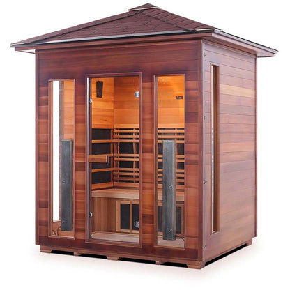 Outdoor sauna with cedar wood exterior and glass doors for a luxurious spa experience.