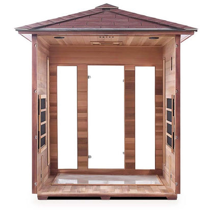 Outdoor wood sauna with a tile roof, featuring glass doors for steam relaxation.