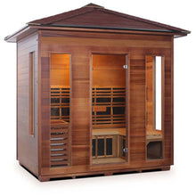 Cedar infrared sauna cabin with large glass panels.