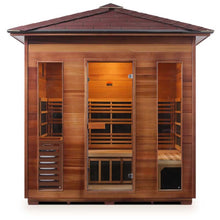 Luxury cedar infrared sauna with glass panels and spacious interior.