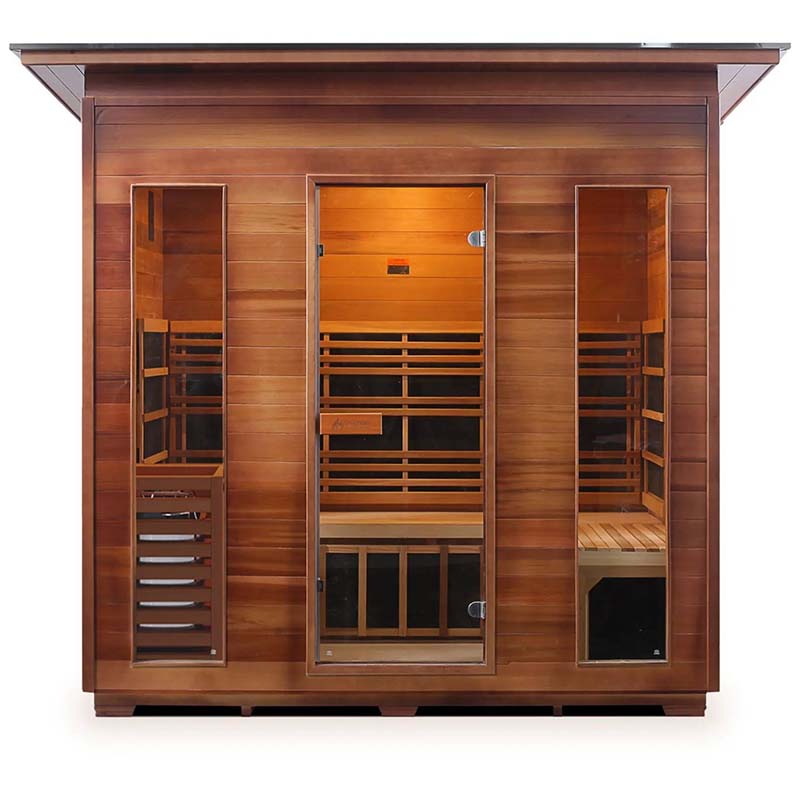 Four-person infrared sauna in rich wood finish.