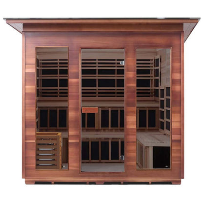 Wooden three-person infrared sauna with clear glass door.
