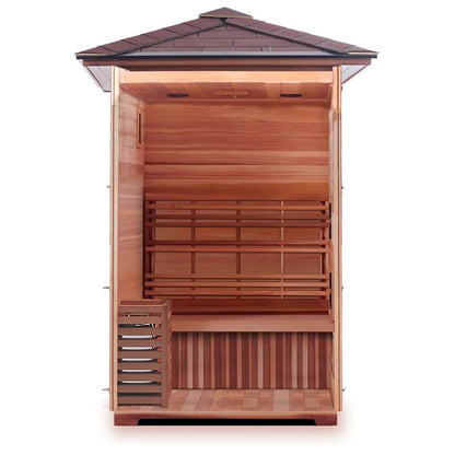 Outdoor infrared home sauna with a wooden interior and a gabled roof.