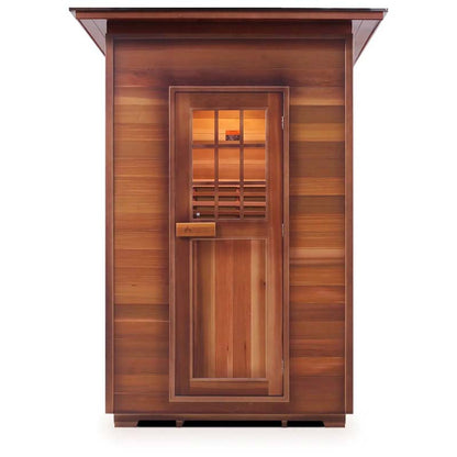 Traditional wooden outdoor sauna with glass-paneled door.