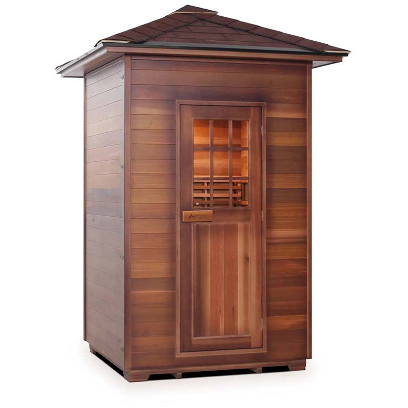 Cedar Nordic sauna with brown wood panels and glass door.