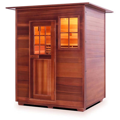 Wooden infrared sauna cabin with warm interior lighting.