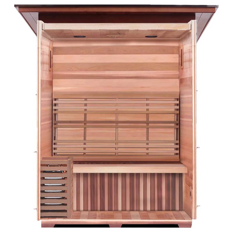 Indoor infrared sauna with cedar wood interior and built-in bench.