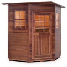 Wooden sauna cabin with glass windows and door, featuring a modern design.