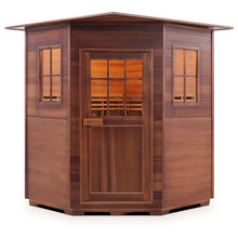 Wooden outdoor sauna with glass windows and door, showcasing a sleek, modern design.