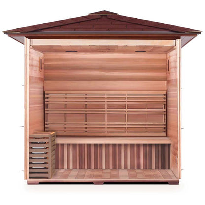 Cedar sauna with open front and slatted benches, featuring a sloped roof design.