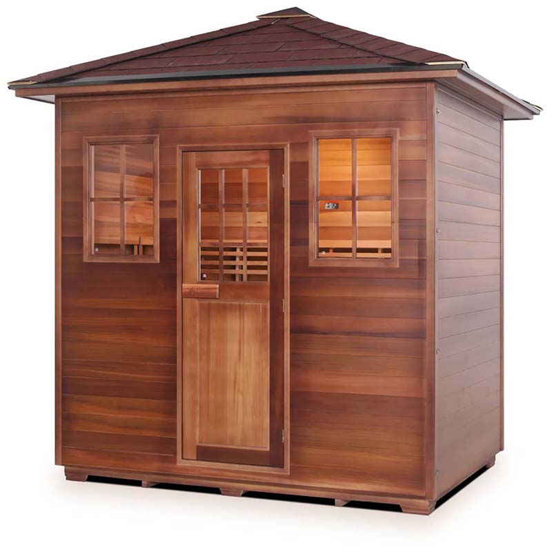 Cedar Scandinavian sauna cabin with wooden exterior and sloped roof, ideal for home relaxation.