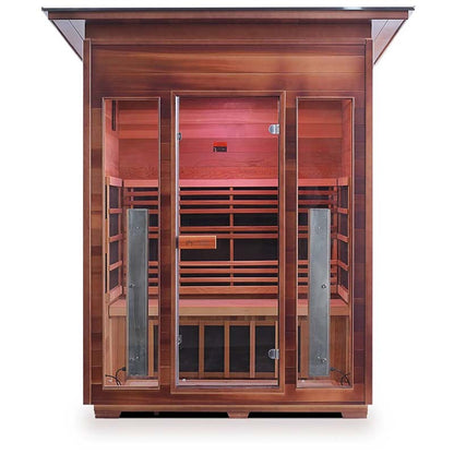 Infrared sauna cabin with glass doors and cedar wood panels.