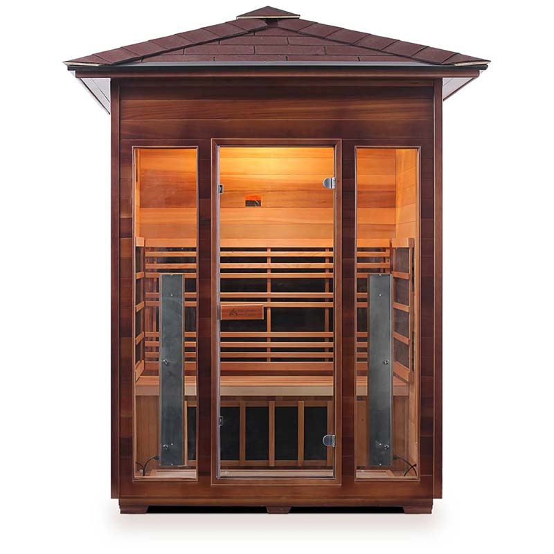 Outdoor infrared sauna with cedar wood construction and glass doors.