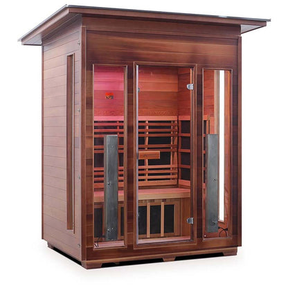 Wooden outdoor sauna with glass doors and infrared panels for home relaxation.