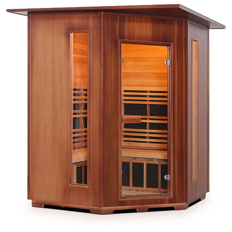 Two-person wooden infrared sauna with glass doors and warm interior lighting.