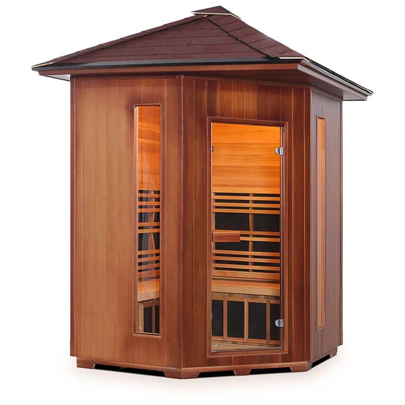 Four-person infrared sauna with cedar wood finish and glass door.
