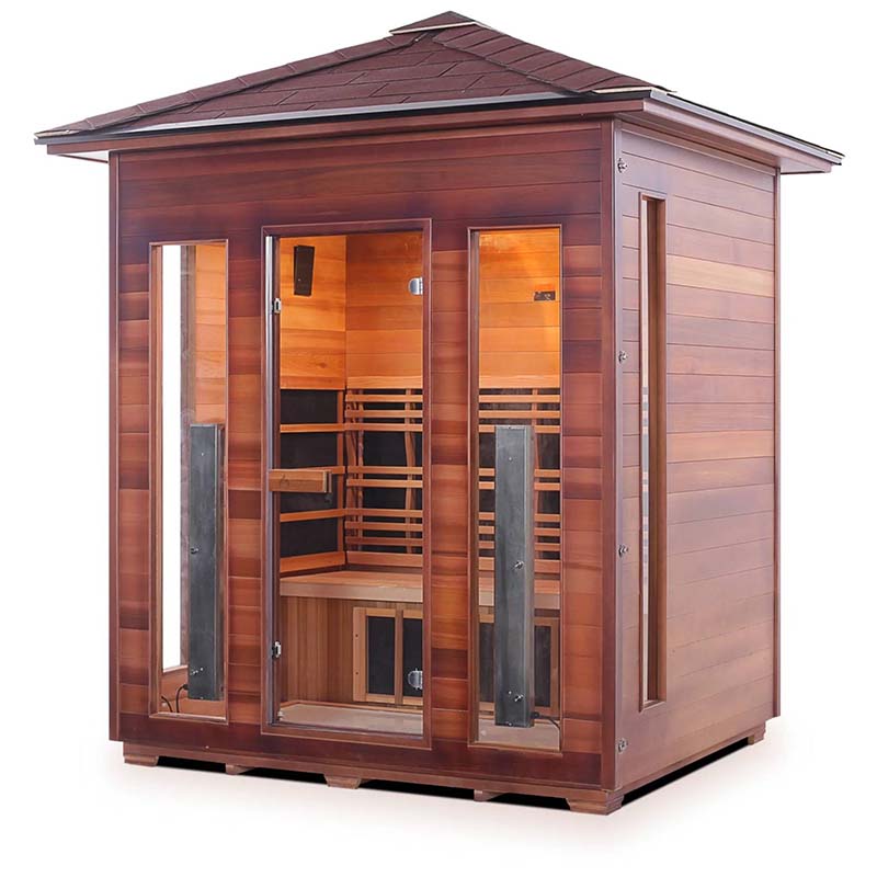 Cedar infrared sauna with glass doors and wooden benches, ideal for home relaxation.