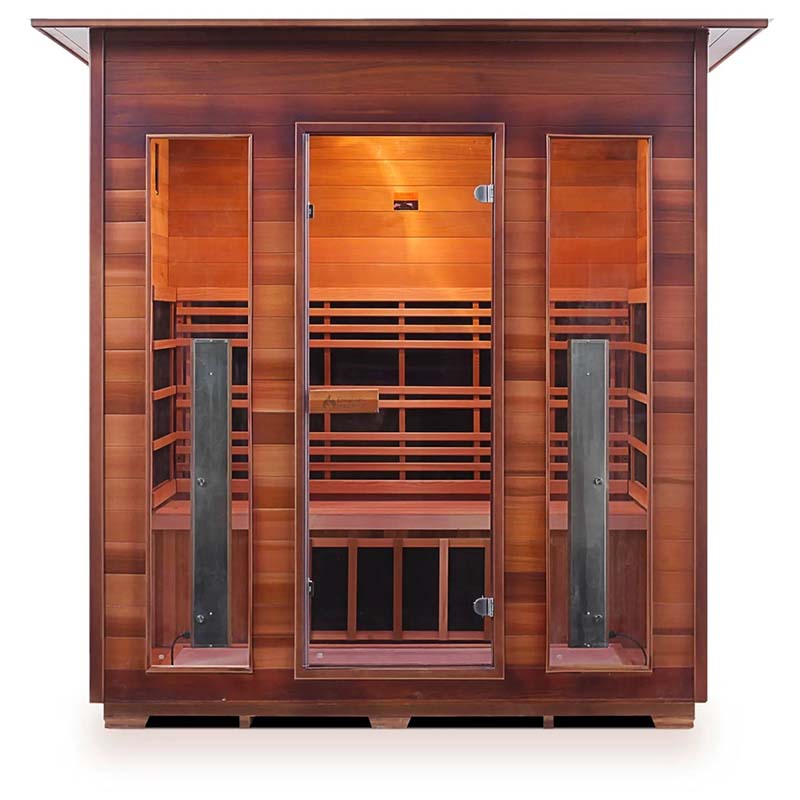 Cedar infrared sauna with glass doors and warm lighting for home relaxation.