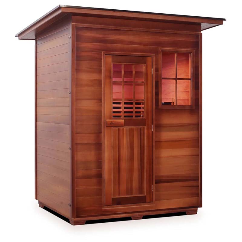 Outdoor cedar sauna with window and slatted door, featuring a modern wood design.
