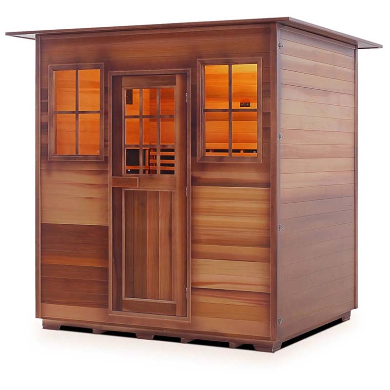 Outdoor cedar sauna with glass windows and door, featuring warm interior light.