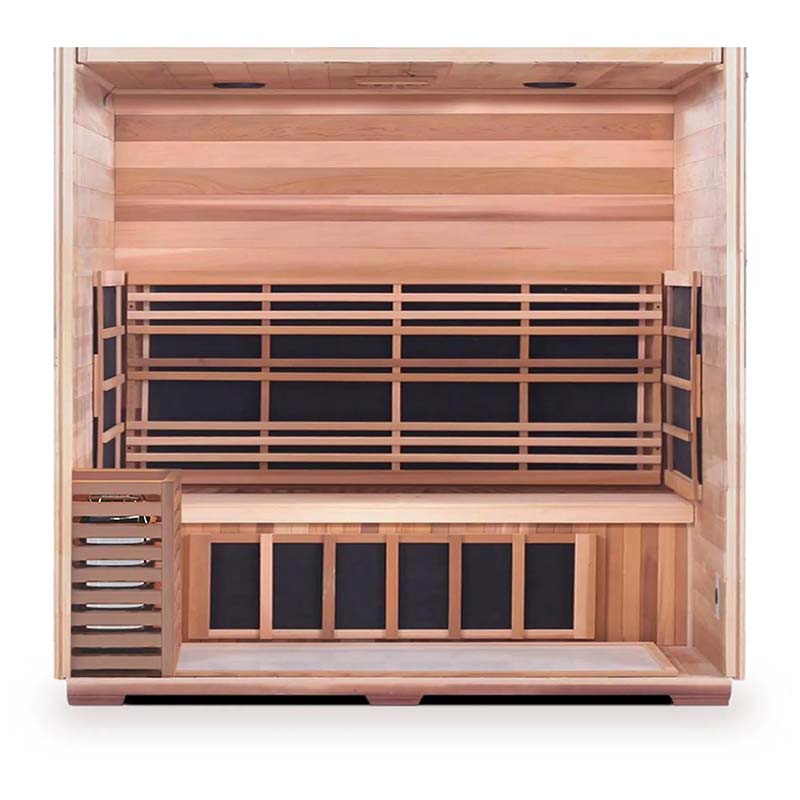 Cedar infrared sauna interior with black carbon heaters and bench seating.