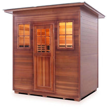 Outdoor cedar sauna with glass-paneled door and windows, featuring a sleek modern design.