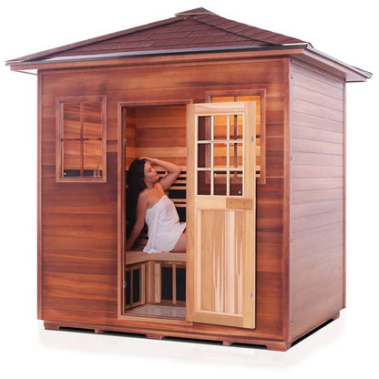Wooden sauna with open door, featuring a woman relaxing inside on a wooden bench.