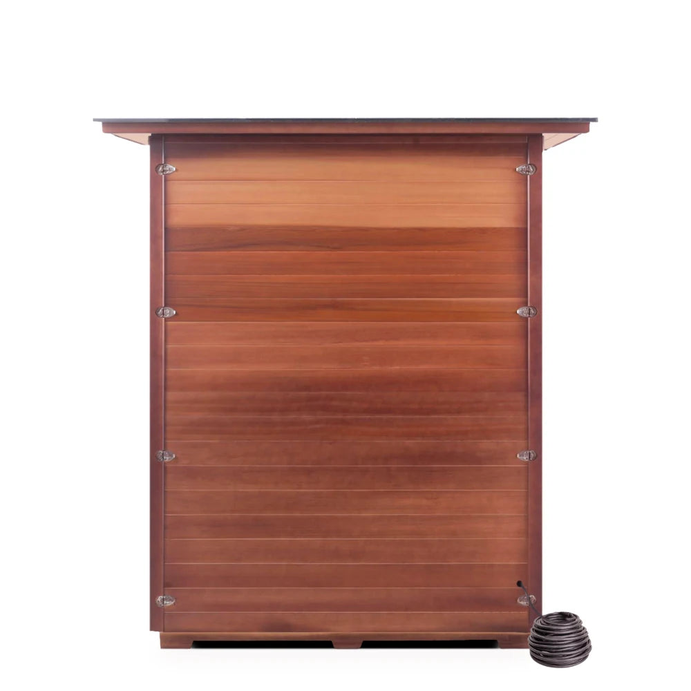 Wooden storage shed with horizontal slats and metal accents, accompanied by a black decorative item on the ground.