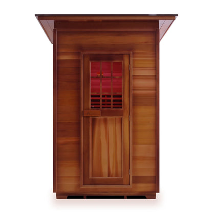Front view of a wooden sauna with a door and small window, showcasing a rich, natural wood finish.