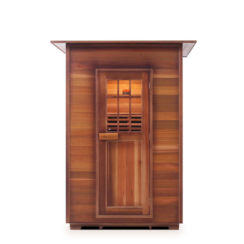 Front view of a wooden sauna with a large door and window, showcasing a natural wood finish and a modern design.