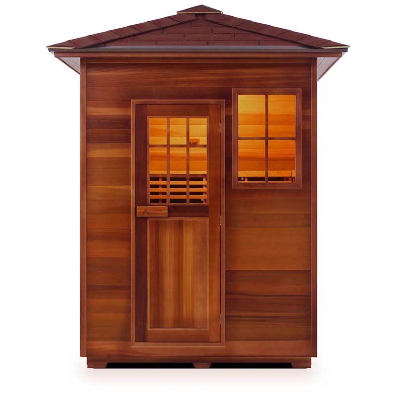 Outdoor cedar sauna with glass door and windows, ideal for relaxation and wellness.